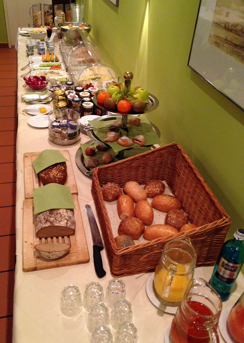 Franconia breakfast spread, juices, breads, toppings, fruit, yoghurt, and more.